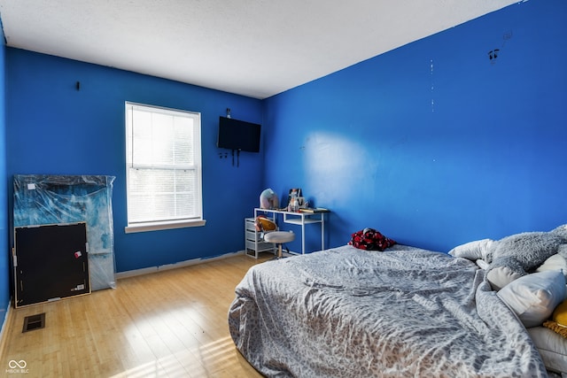 9525 Longwell Dr, Indianapolis, IN 46240 - bedroom featuring wood finished floors and baseboards