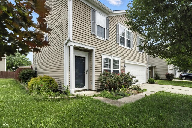 1236 N Aberdeen Dr, Franklin, IN 46131 - view of front facade featuring an attached garage and driveway