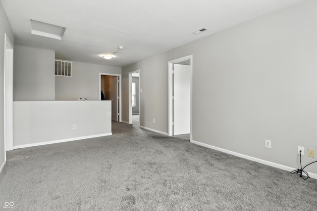 1236 N Aberdeen Dr, Franklin, IN 46131 - empty room featuring carpet flooring and attic access