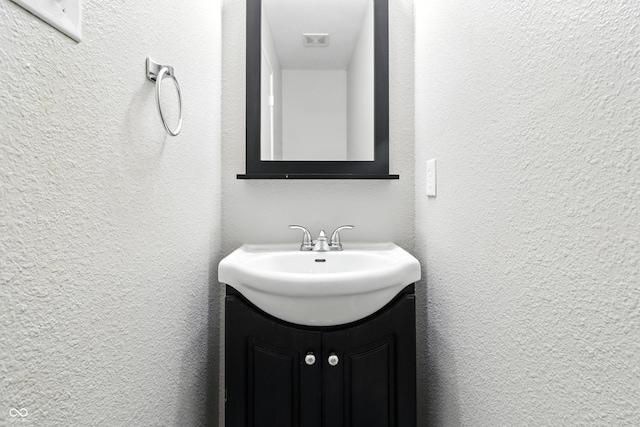 1236 N Aberdeen Dr, Franklin, IN 46131 - bathroom featuring a textured wall and vanity