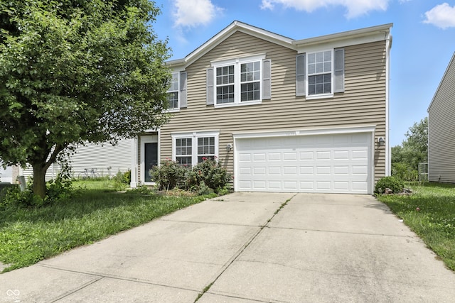 1236 N Aberdeen Dr, Franklin, IN 46131 - view of front of house featuring a garage and driveway