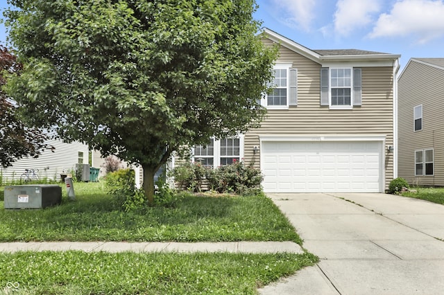1236 N Aberdeen Dr, Franklin, IN 46131 - view of property hidden behind natural elements featuring an attached garage and driveway