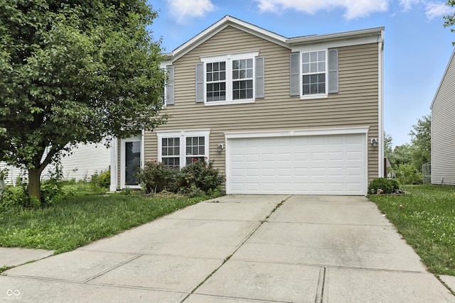 1236 N Aberdeen Dr, Franklin, IN 46131 - traditional-style house featuring a garage, concrete driveway, and a front yard