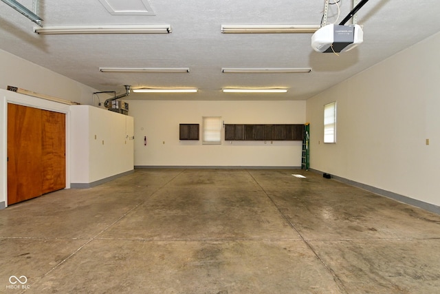 136 W Loretta Dr, Indianapolis, IN 46217 - garage with a garage door opener and baseboards