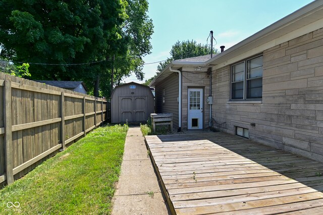 136 W Loretta Dr, Indianapolis, IN 46217 - fenced backyard featuring a deck and a shed