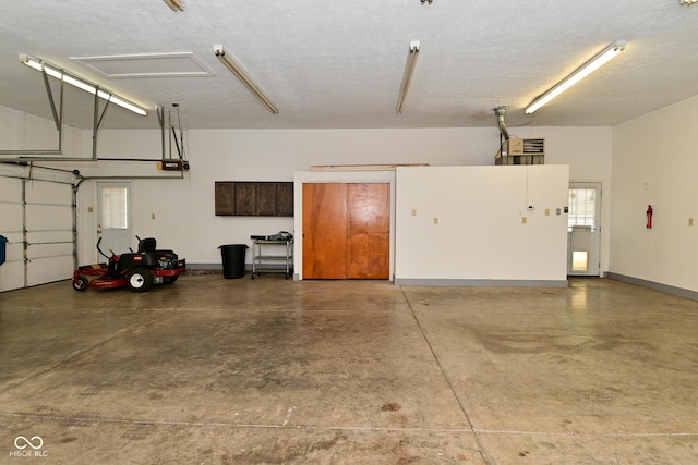 136 W Loretta Dr, Indianapolis, IN 46217 - garage with a garage door opener and baseboards