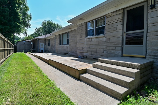 136 W Loretta Dr, Indianapolis, IN 46217 - view of yard featuring a shed and a wooden deck