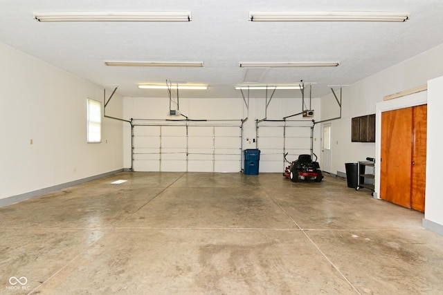136 W Loretta Dr, Indianapolis, IN 46217 - garage featuring a garage door opener