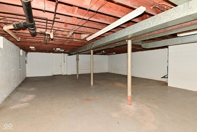 136 W Loretta Dr, Indianapolis, IN 46217 - unfinished basement with concrete block wall