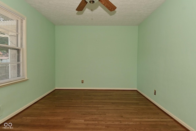 136 W Loretta Dr, Indianapolis, IN 46217 - empty room featuring a textured ceiling, wood finished floors, and ceiling fan