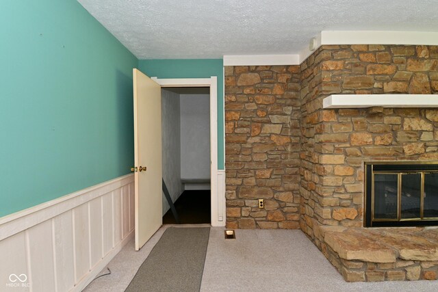 136 W Loretta Dr, Indianapolis, IN 46217 - hall with a textured ceiling, carpet flooring, and a wainscoted wall