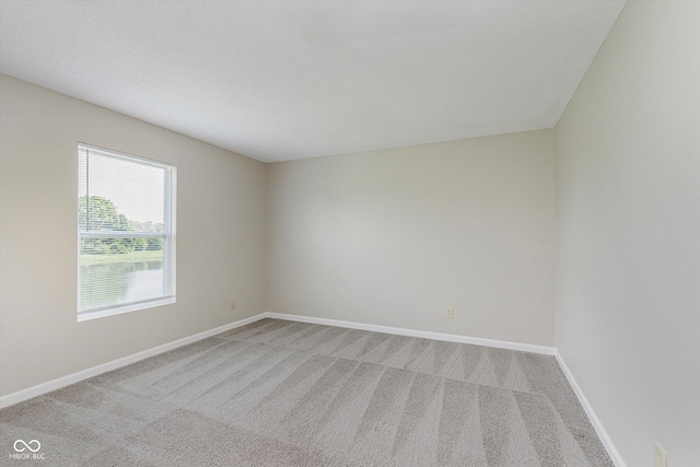 7572 Wymm Ln, Ingalls, IN 46048 - spare room with light colored carpet and baseboards