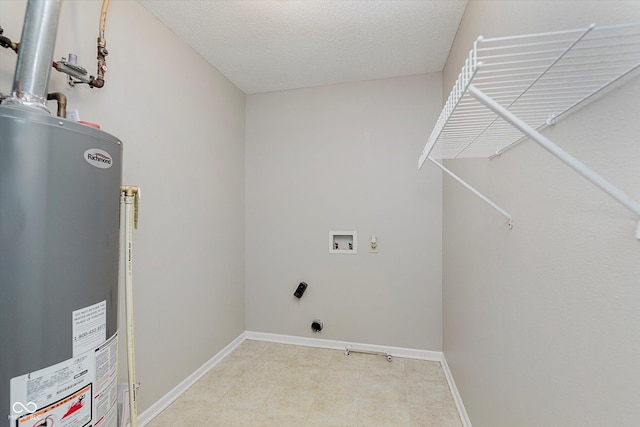 7572 Wymm Ln, Ingalls, IN 46048 - laundry area featuring water heater, hookup for a washing machine, electric dryer hookup, and a textured ceiling