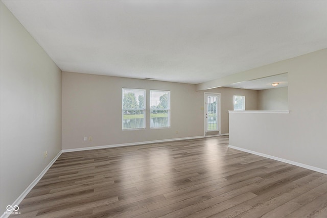 7572 Wymm Ln, Ingalls, IN 46048 - unfurnished living room featuring wood finished floors