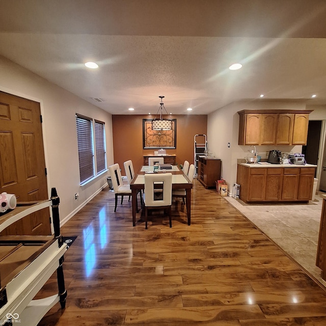 10775 Cyrus Dr, Indianapolis, IN 46231 - dining area with wood finished floors and recessed lighting