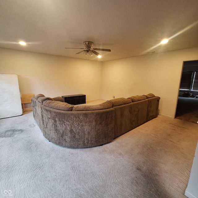 10775 Cyrus Dr, Indianapolis, IN 46231 - carpeted living room with ceiling fan and recessed lighting