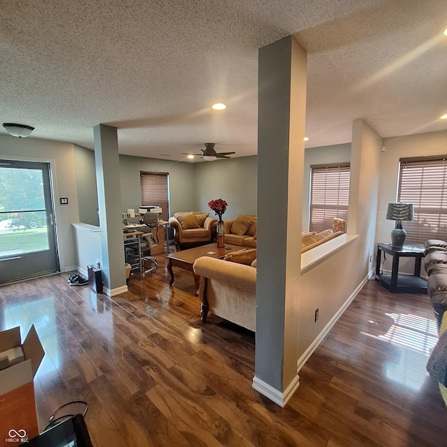 10775 Cyrus Dr, Indianapolis, IN 46231 - living area with a textured ceiling, a ceiling fan, dark wood-style flooring, and recessed lighting