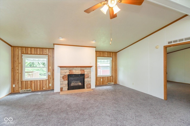 305 Pike St, Darlington, IN 47940 - unfurnished living room with ornamental molding, carpet flooring, ceiling fan, plenty of natural light, and vaulted ceiling