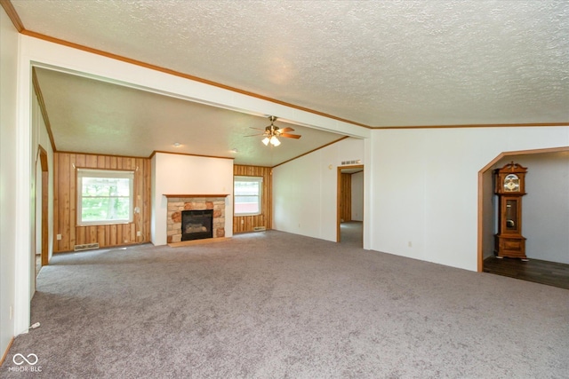 305 Pike St, Darlington, IN 47940 - unfurnished living room featuring crown molding, ceiling fan, carpet, arched walkways, and a textured ceiling