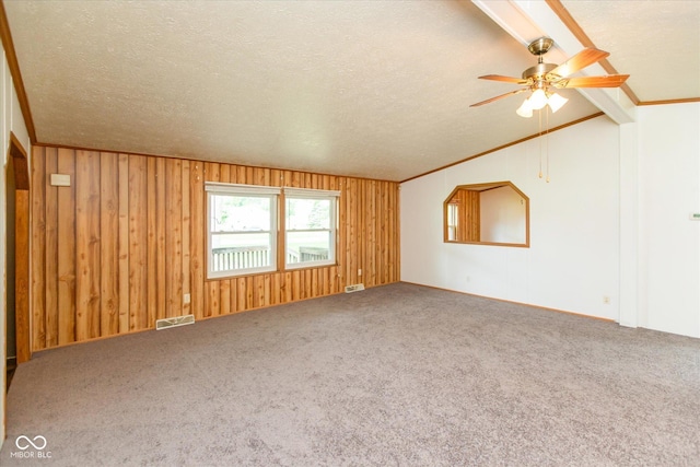 305 Pike St, Darlington, IN 47940 - unfurnished room featuring vaulted ceiling, ceiling fan, carpet, crown molding, and a textured ceiling