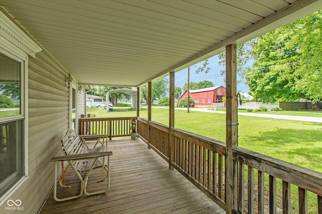 305 Pike St, Darlington, IN 47940 - wooden porch featuring a yard