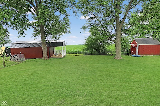 2587 E State Road 55, Wingate, IN 47994 - view of green lawn with a shed