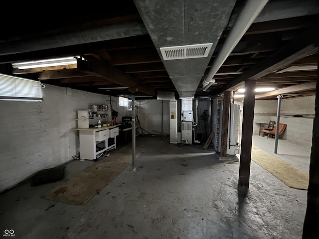 1900 S 25th St, Terre Haute, IN 47802 - unfinished basement with water heater and heating unit