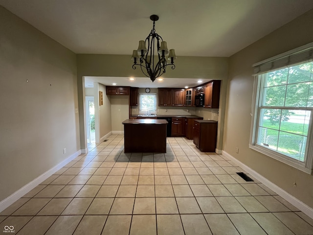 1900 S 25th St, Terre Haute, IN 47802 - kitchen with light tile patterned floors, healthy amount of natural light, a kitchen island, a chandelier, and recessed lighting