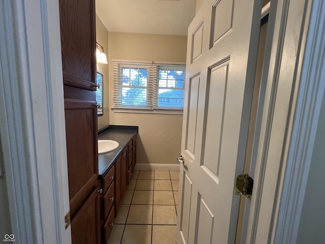 1900 S 25th St, Terre Haute, IN 47802 - bathroom featuring vanity and tile patterned floors