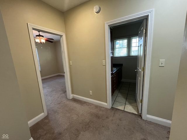 1900 S 25th St, Terre Haute, IN 47802 - hallway featuring light carpet and baseboards