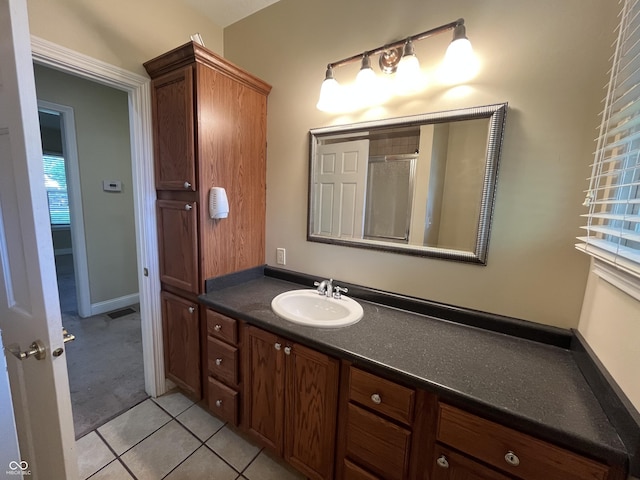 1900 S 25th St, Terre Haute, IN 47802 - full bath with vanity and tile patterned floors