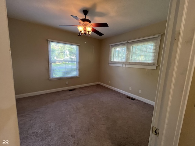 1900 S 25th St, Terre Haute, IN 47802 - empty room featuring ceiling fan and carpet floors