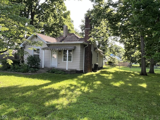 1900 S 25th St, Terre Haute, IN 47802 - view of front of house with a chimney