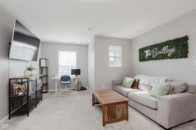 5809 Terracotta Trce, Mccordsville, IN 46055 - living area featuring an office area, healthy amount of natural light, and light colored carpet