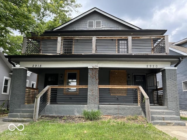 2918 Ruckle St, Indianapolis, IN 46205 - american foursquare style home featuring a porch and a balcony