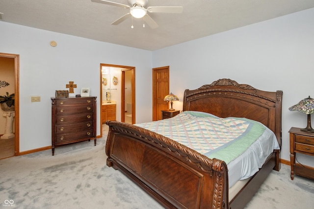 439 Alisa Ave, Seymour, IN 47274 - bedroom featuring light carpet, a ceiling fan, and ensuite bath