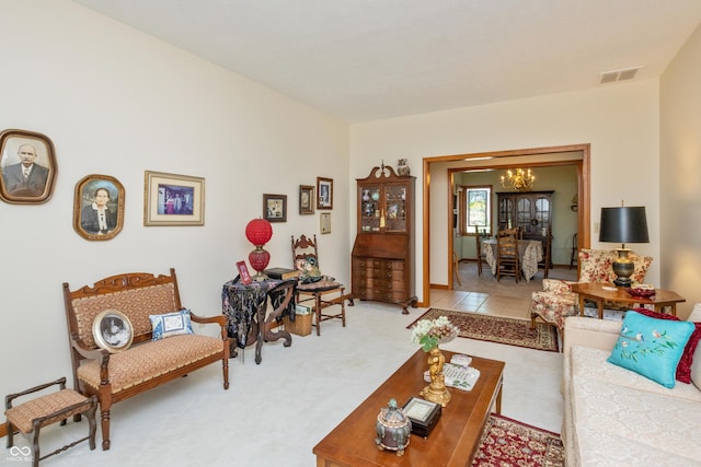 439 Alisa Ave, Seymour, IN 47274 - carpeted living room featuring a chandelier