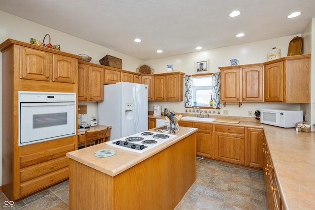 439 Alisa Ave, Seymour, IN 47274 - kitchen with white appliances, light countertops, light stone finish floors, and recessed lighting
