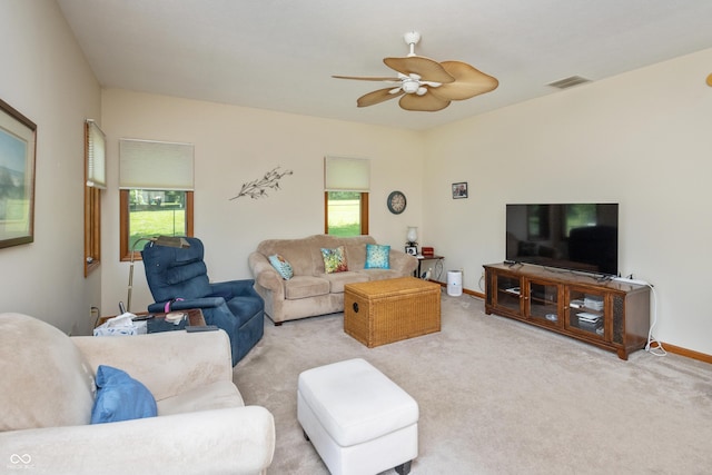 439 Alisa Ave, Seymour, IN 47274 - carpeted living area with a ceiling fan and baseboards