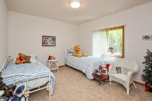 439 Alisa Ave, Seymour, IN 47274 - carpeted bedroom featuring baseboards