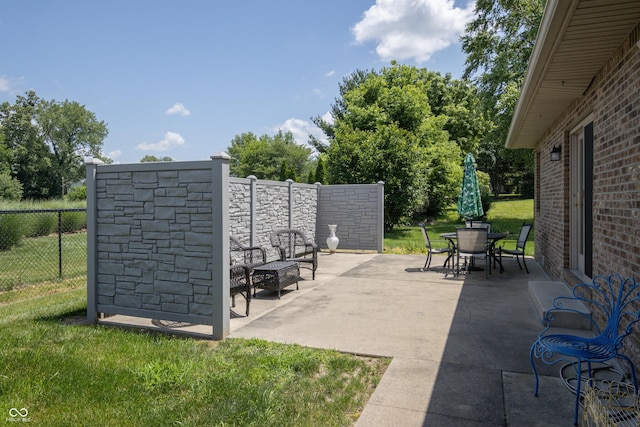 439 Alisa Ave, Seymour, IN 47274 - view of home's community featuring a patio and outdoor dining space