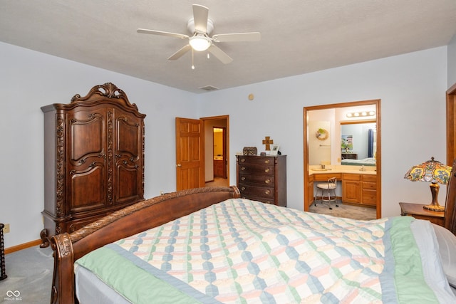 439 Alisa Ave, Seymour, IN 47274 - bedroom featuring carpet, ensuite bathroom, a ceiling fan, and a desk