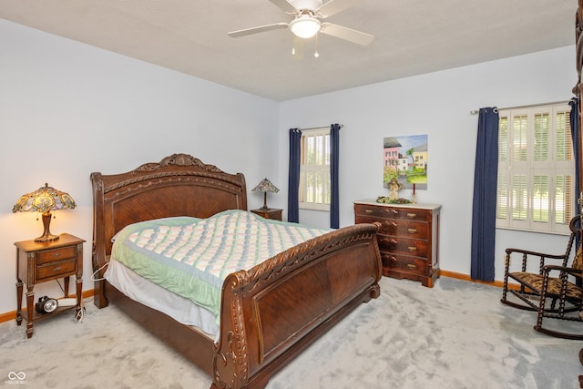 439 Alisa Ave, Seymour, IN 47274 - carpeted bedroom with baseboards and a ceiling fan