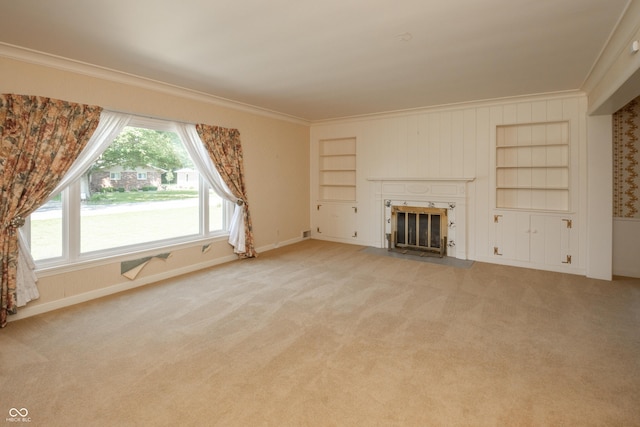 660 E Dr, Seymour, IN 47274 - unfurnished living room featuring crown molding, built in features, a fireplace with flush hearth, and light carpet