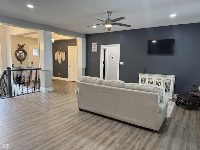 188 Gettysburg, Coatesville, IN 46121 - living room with wood finished floors, a ceiling fan, recessed lighting, and decorative columns