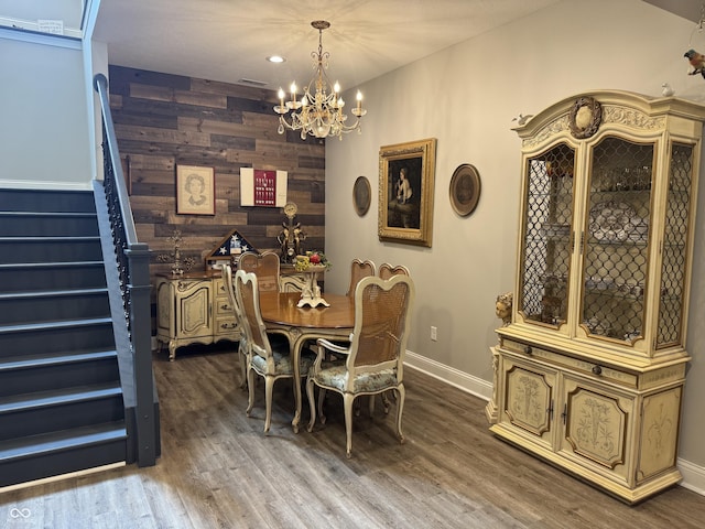 188 Gettysburg, Coatesville, IN 46121 - dining space featuring a chandelier, wood walls, stairway, wood finished floors, and recessed lighting