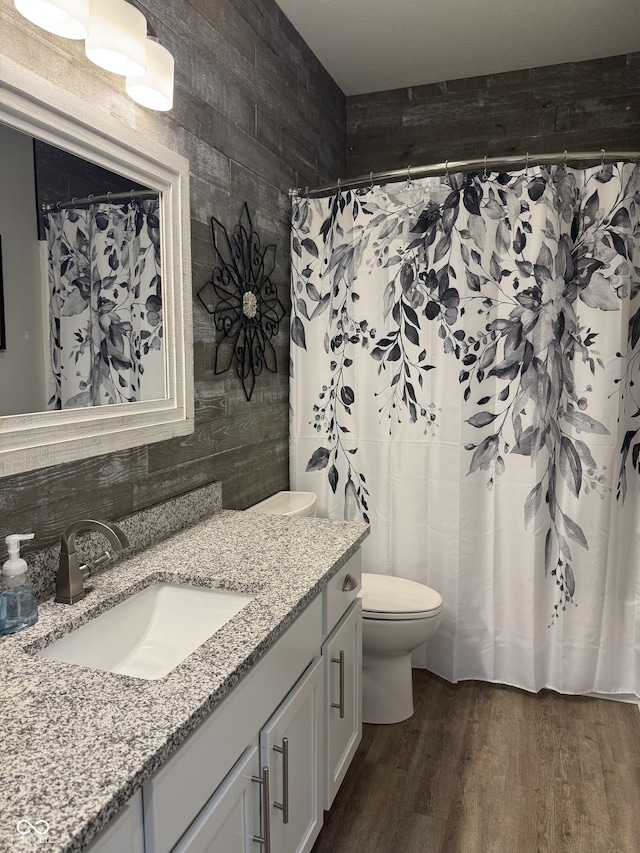 188 Gettysburg, Coatesville, IN 46121 - full bathroom featuring vanity, wood finished floors, and a shower with shower curtain