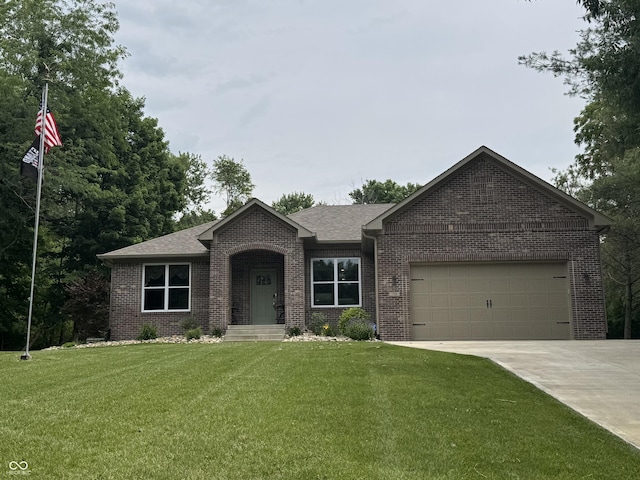 188 Gettysburg, Coatesville, IN 46121 - ranch-style house with brick siding, a garage, concrete driveway, a front lawn, and roof with shingles