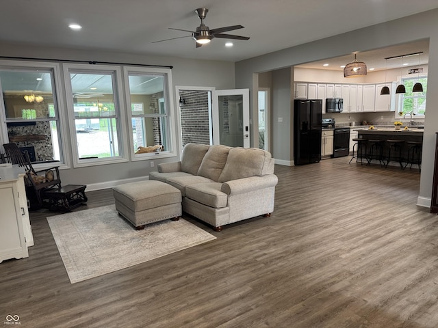 188 Gettysburg, Coatesville, IN 46121 - living area featuring a ceiling fan, dark wood-style floors, and recessed lighting