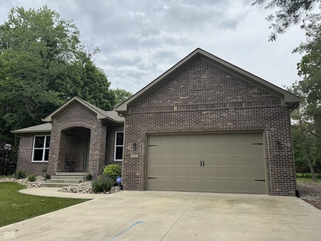 188 Gettysburg, Coatesville, IN 46121 - ranch-style home featuring brick siding, driveway, and a garage